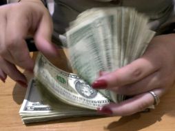 El Banco de México subasta diariamente 200 millones de dólares ante la reciente volatilidad en los mercados financieros. AP / ARCHIVO