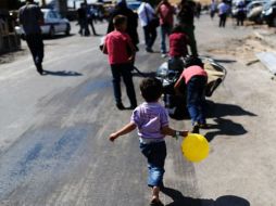 A punto de cumplir cuatro años, el conflicto sirio ha causado más de 200 mil muertos y millones de refugiados. AFP / ARCHIVO