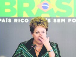 DOLOR. Dilma Rousseff, quien también fue víctima de la dictadura, perdió la compostura en su discurso de presentación del informe. AFP /