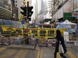 Líderes de la protesta se comprometen a mantener su campaña de desobediencia civil por otras vías. AP / K. Cheung