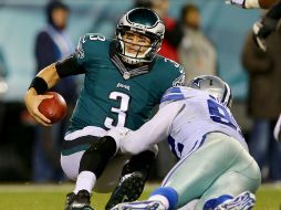 Tony Romo completó 22 de sus 31 envíos, mientras que Mark Sánchez hizo efectivo 17 de sus 28 pases. AFP / ELSA