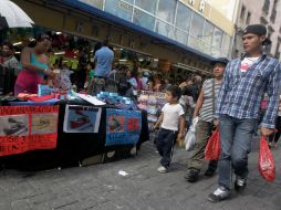 De cada 100 pesos generados de PIB del país, 25 los generan 59 por ciento de ocupados en informalidad. EL INFORMADOR / ARCHIVO