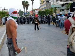 La riña entre maestros de la CETEG y policías federales dejó 22 heridos, entre ellos seis uniformados que terminaron en estado grave. AP / A. González