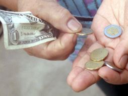 El tipo de cambio se ubicó en 14.5562 pesos. NTX / ARCHIVO