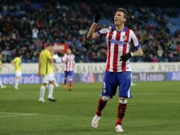 Mandzukic celebra uno de los dos tantos que anotó para el Atlético. AP / D. Ochoa