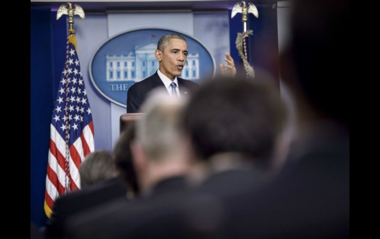 El presidente Barack Obama, durante el encuentro con la prensa antes de iniciar su periodo vacacional. AFP / B. Smialowski