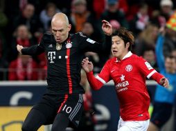 Sobre el final, Arjen Robben (10) rescató la victoria del Bayern al minuto 90 en Mainz. AFP / D. Roland