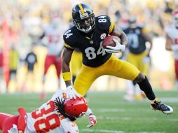 Antonio Brown atrapa siete pases y un touchdown para los Acereros, que han ganado sete de sus últimos nueve duelos. AP / D. Wright