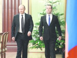 Vladimir Putin y Dmitri Medvédev. El primer ministro recordó que Rusia ya superó la recesión de 2009. EFE /