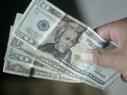 El tipo de cambio para solventar obligaciones en moneda extranjera pagaderas es de 14.7180. EL INFORMADOR / ARCHIVO