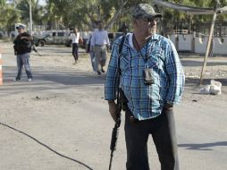 Acusan a Mora de aprovecharse de su puesto como líder de la Fuerza Rural de La Ruana. AP / G. Aguado