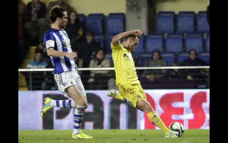 El gol fue obra del ruso Denis Cheryshev (d) al minuto 71. EFE / D. Castelló