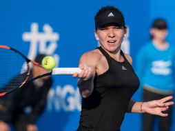 Halep enfrentará a la tenista china Saisai Zheng en la siguiente ronda. AFP / STR