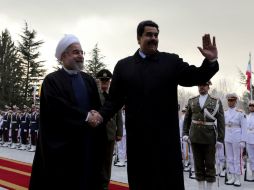 El presidente iraní Hasan Rouhani (i) y su homólogo venezolano Nicolás Maduro (d). AFP / A. Kenare