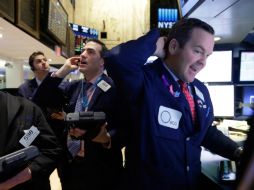 En una jornada atenta a la publicación del balance fiscal de diciembre y el índice de optimismo de los pequeños negocios en EU. AP / R. Drew