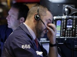 Los bancos estadounidenses cerraron con caídas y mayor estrés para el cierre de este jueves. AP / ARCHIVO