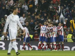 Fernando Torres dejó su sello con sus primeros goles oficiales de rojiblanco. EFE / K. Huesca