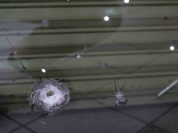 La puerta resultó dañada pero la dama está ilesa. NTX / ARCHIVO