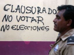 Después de un intercambio de palabras entre manifestantes y consejeros, ambas partes concluyeron llevar a cabo diálogo público. AFP / ARCHIVO