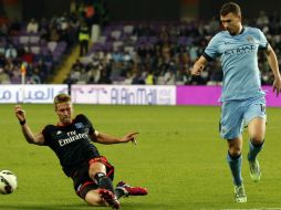 El bosnio Edin Dzeko anota el segundo gol al minuto 74 del partido. AFP / K. Sahib
