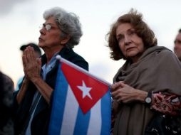 Manifestantes en el Monumento a la Memoria de Cuba, solicitando el tratamiento de temas como la migración. AFP / J. Raedle