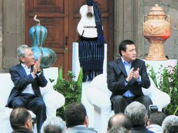 Miguel Ángel Osorio Chong, titular de Gobernación, acompaña al gobernador de la Entidad, Salvador Jara. SUN / ARCHIVO