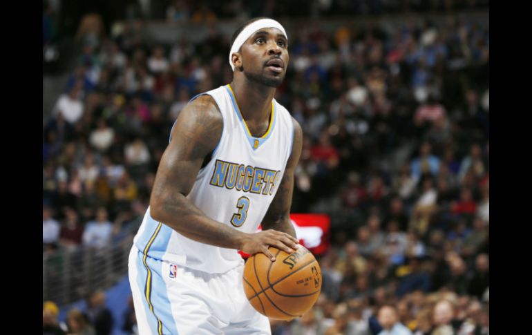 El basquetbolista sale libre tras pagar una fianza de mil 500 dólares, según el Sheriff de Denver. AP / D. Zalubowski