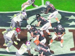 Parejo. Tony Romo, lanzador de los Vaqueros de Dallas durante el Pro Bowl disputado en Glendale, Arizona. AP /