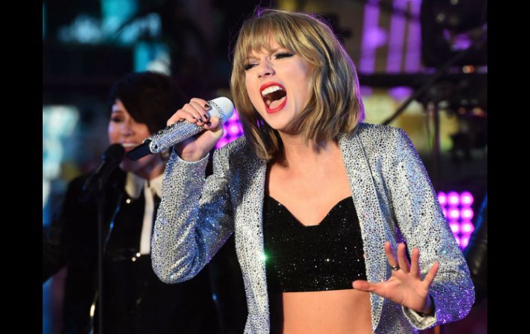 'La Reina del Pop' dijo que no puede sacar las canciones de Tay de su cabeza. AFP / ARCHIVO