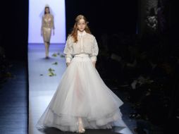 El desfile de Gaultier encuentra una vía de creatividad en las mitades diferenciadas. AFP / J. Brinon
