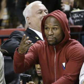 Pacquiao y Mayweather charlan en privado