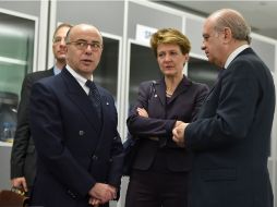 Bernard Cazaneuve (i), Simonetta Sommaruga (c) y Jorge Fernández Díaz (d) en Riga, Letonia. AFP / I. Znotins