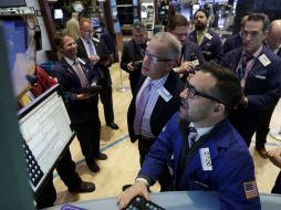 El selectivo S&P 500 y el índice compuesto del mercado Nasdaq también avanzaron en Wall Street. AP / ARCHIVO