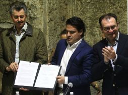 El titular de la CRT, Miguel Ángel Domínguez, Aristóteles Sandoval y Luis Videgaray. EL INFORMADOR / E. Barrera