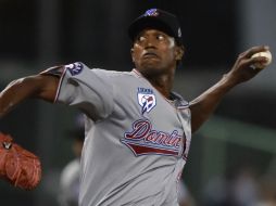 El pitcher Marion Arias, de República Dominicana, dejó en dos carreras a Puerto Rico, pero no tuvo apoyo de su ofensiva. AFP /  P. Richards
