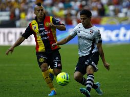 El enfrentamiento entre los equipos tapatíos terminó 2-0 a favor del Atlas. AFP / H. Guerrero