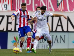 El club informa que la lesión es en el muslo izquierdo sufrida durante el partido conta el Atlético de Madrid. AFP / D. Pozo