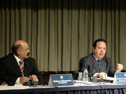 El presidente del Banco Central de Venezuela, Nelson Merentes y el ministro de Economía, Rodolfo Marco anunciaron el nuevo sistema. AFP / F. Parra