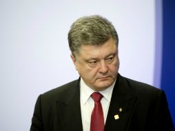 ''No quiero que nadie se haga ilusiones. Y que yo parezca un ingenuo'', afirmó Poroshenko. AFP / A. Jocard