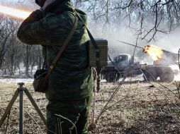 El alto al fuego fue establecido este jueves; Petro Poroshenko acusa a Rusia de violarlos. AFP / A. Borodulin
