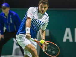 Stan Wawrinka logra su victoria individual número 350 ante el segundo favorito del torneo, Raonic. AP / P. Post
