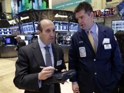 Los operadores en el parqué neoyorquino lograron en la recta final de la jornada borrar las pérdidas que habían acumulado. AP / ARCHIVO