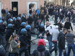 Según portavoces de la policía, los hechos más graves se verificaron en la céntrica Plaza de España. EFE / V. Tersigni