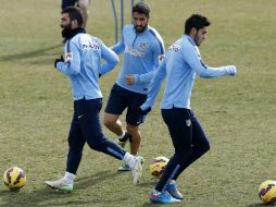 Jiménez (d) volverá a esperar una oportunidad con los Colchoneros. EFE / J. Hidalgo