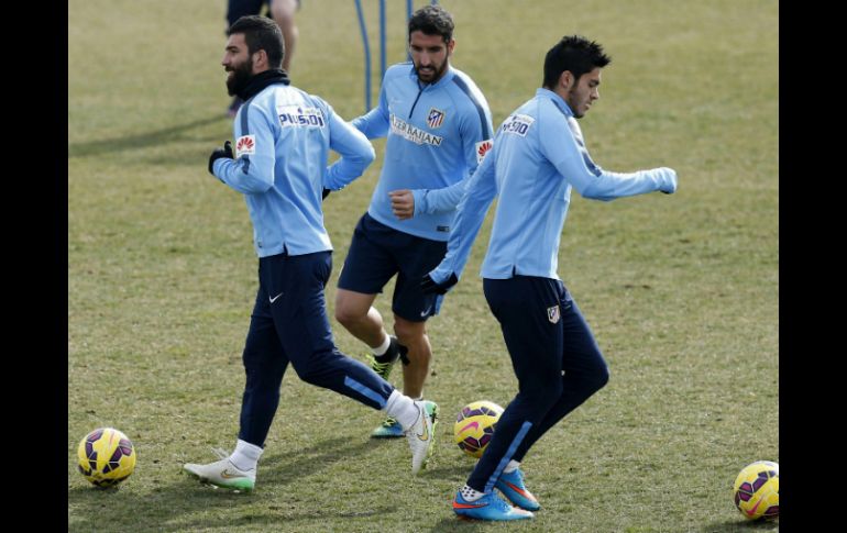 Jiménez (d) volverá a esperar una oportunidad con los Colchoneros. EFE / J. Hidalgo