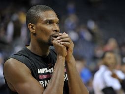 Bosh deja la temporada con 21.1 puntos anotados y promedio de 7.0 rebotes por partido. AFP / B. Dill