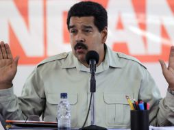 Nicolás Maduro advierte que el que siga por los atajos terminará en manos de la justicia. AP / ARCHIVO
