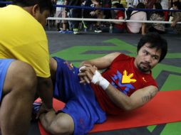 Pacquiao tiene 36 años y apenas cinco derrotas en su carrera. AFP / STR