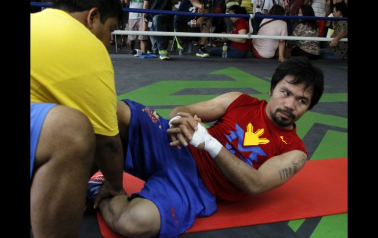 Pacquiao tiene 36 años y apenas cinco derrotas en su carrera. AFP / STR