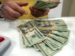 El banxico informó que el tipo de cambio para solventar obligaciones en moneda extranjera se sitúa en 15.0832 pesos. EL INFORMADOR / ARCHIVO